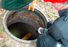 Man working septic system